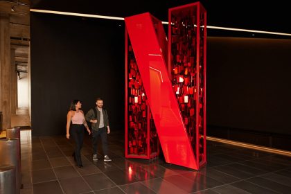 A large Netflix logo sitting inside of a building.