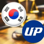 South Korean flag symbol alongside the Upbit cryptocurrency exchange logo, representing crypto regulation and trading in South Korea.