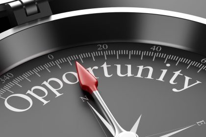A compass witht he word opportunity in it.